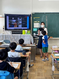 Students and a teacher in a classroom