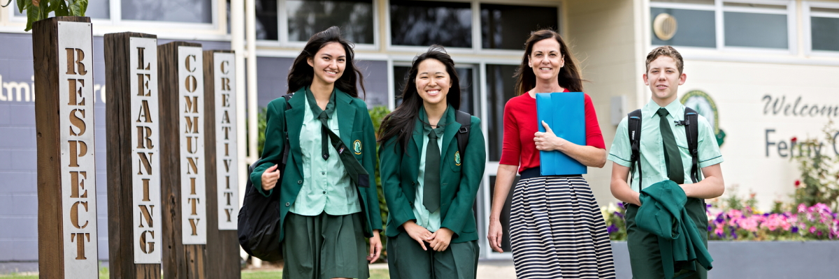 Students walking with a teacher