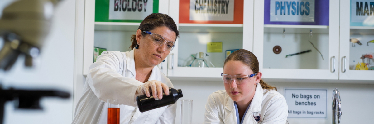 Teacher and a student in a science lab