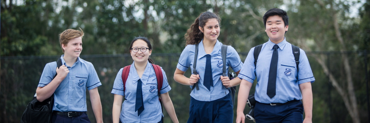 A group of students carrying their backpacks