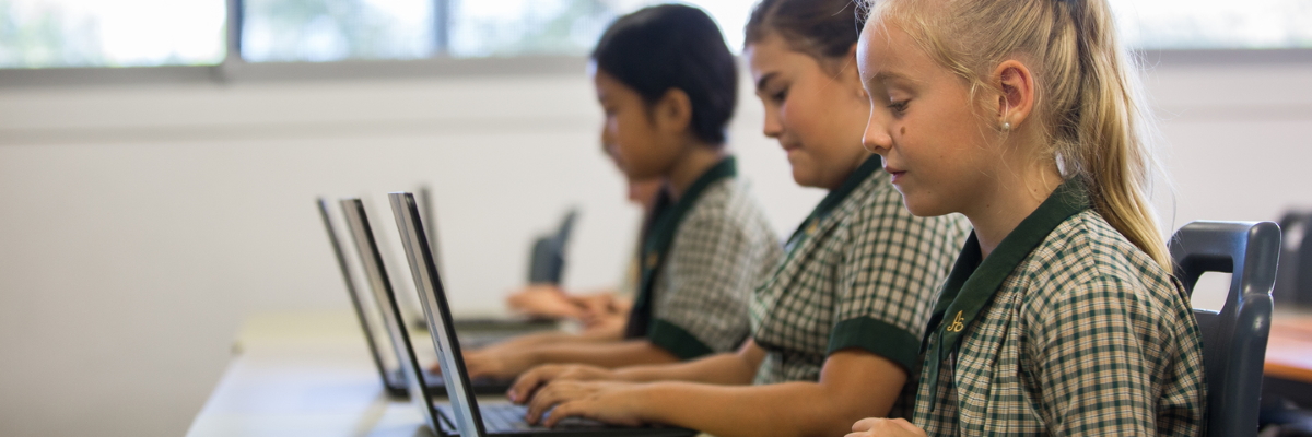 Students in a class on their laptops